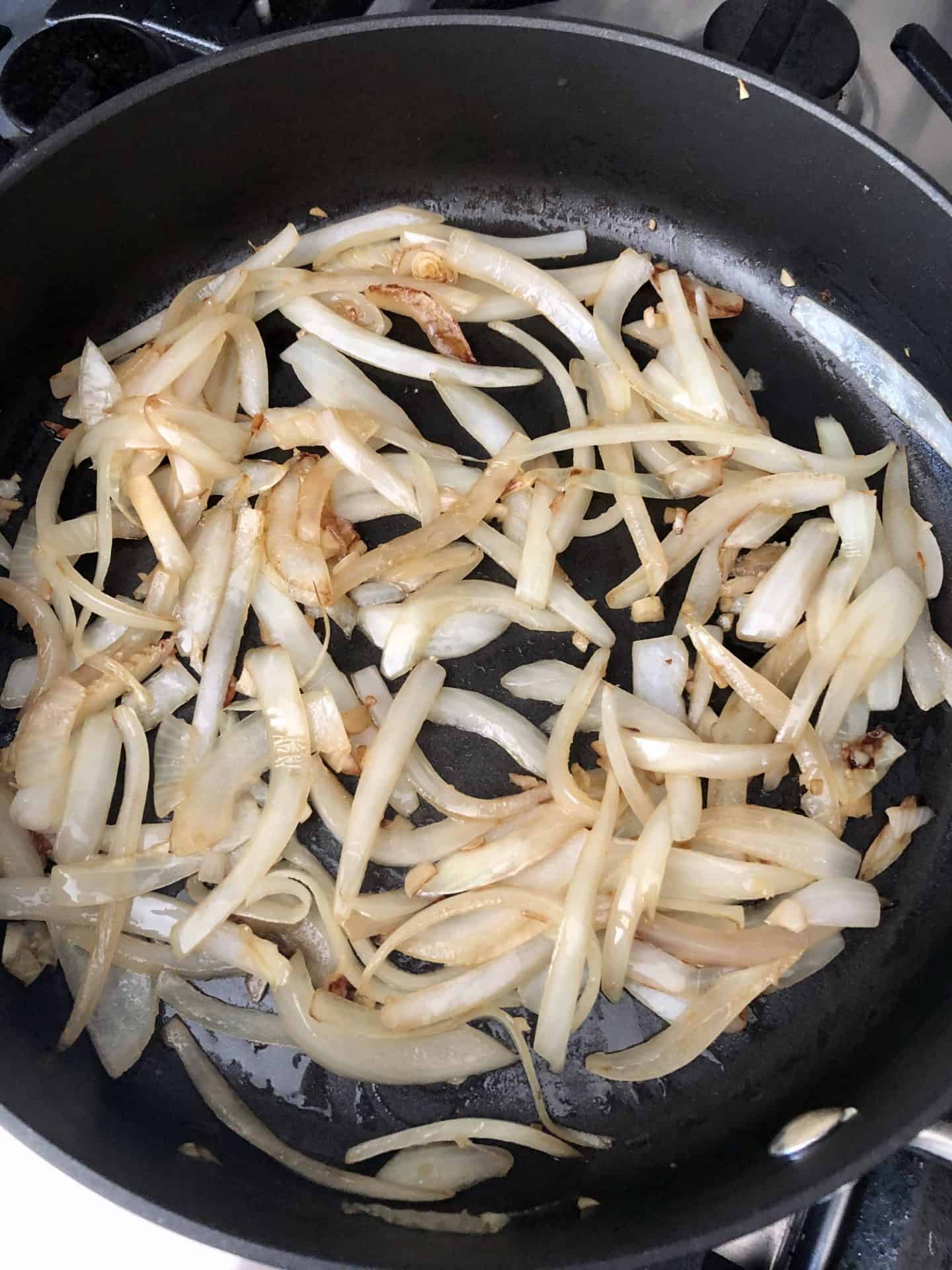 Onions sautéing in pan