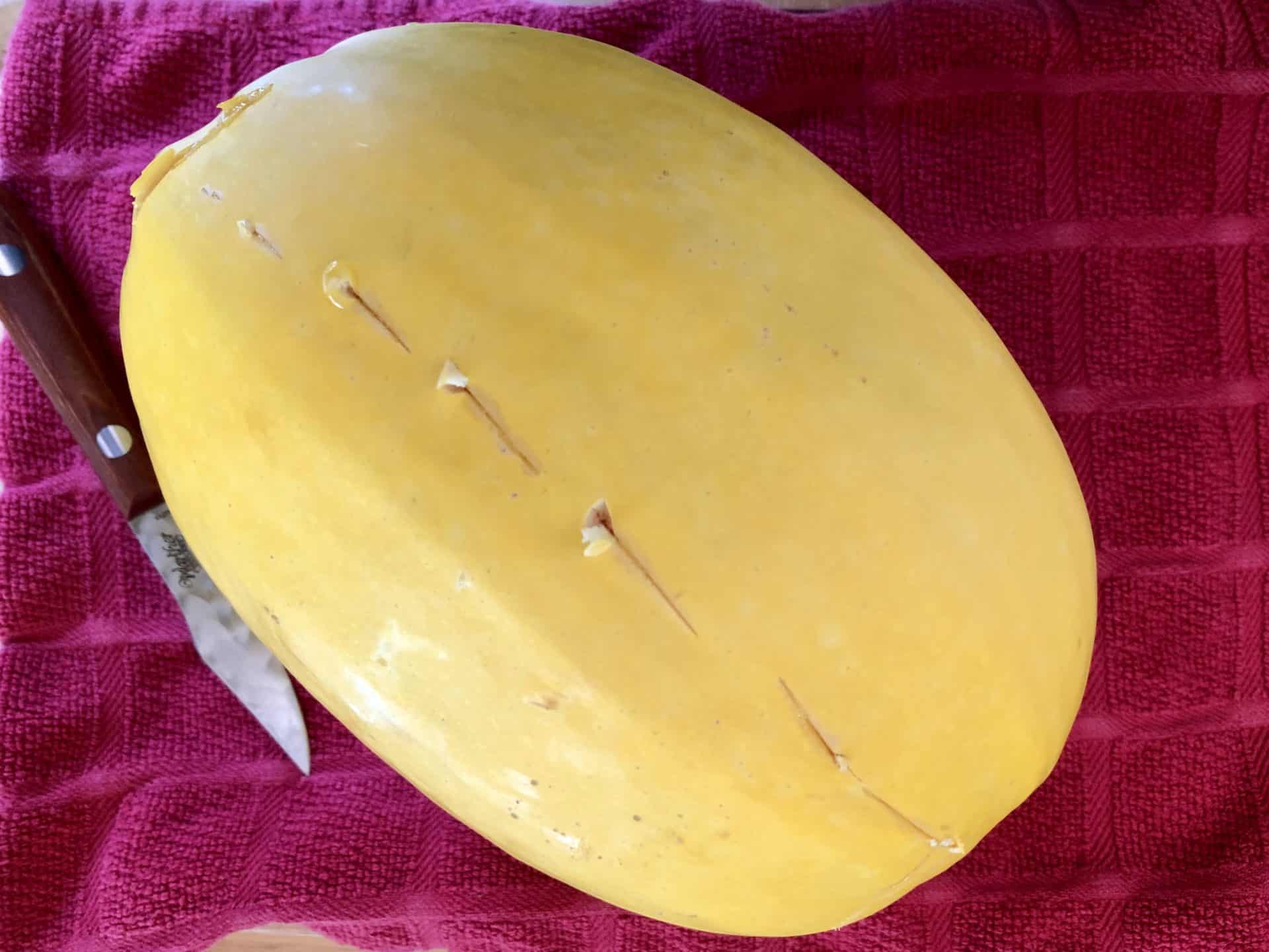 Spaghetti Squash with knife slices down center line