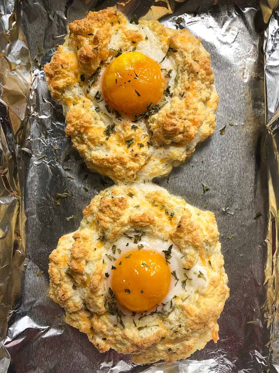 Cheddar bay egg fluffs cooked and topped with parsley overhead shot