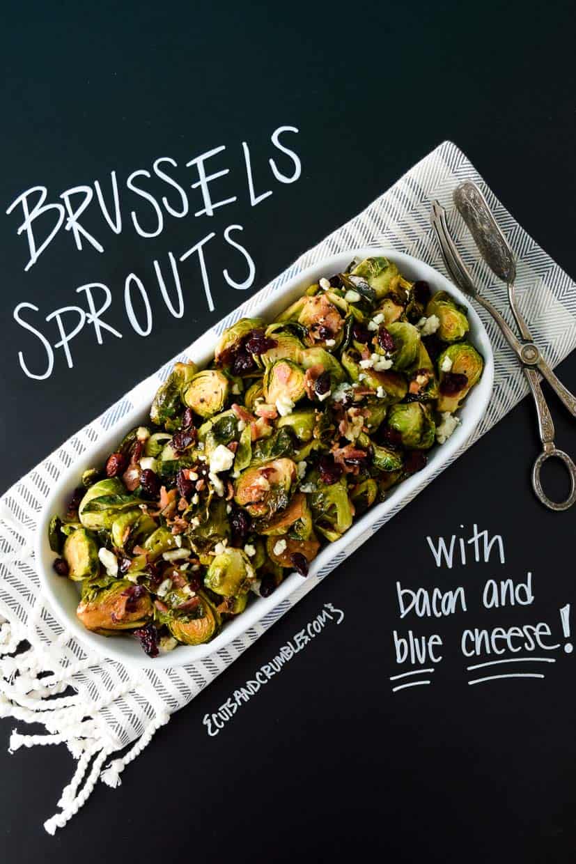 Brussels Sprouts with Bacon and Blue Cheese on platter with title written on chalkboard