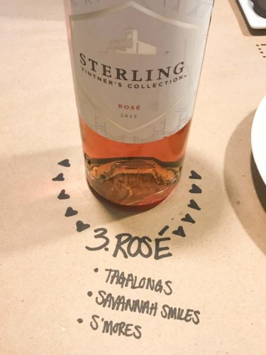 bottle of rosé on brown paper with cookie pairings written underneath