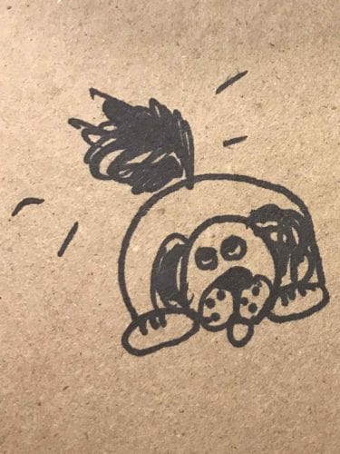 drawing of a dog wagging his tail drawn with sharpie on brown paper 