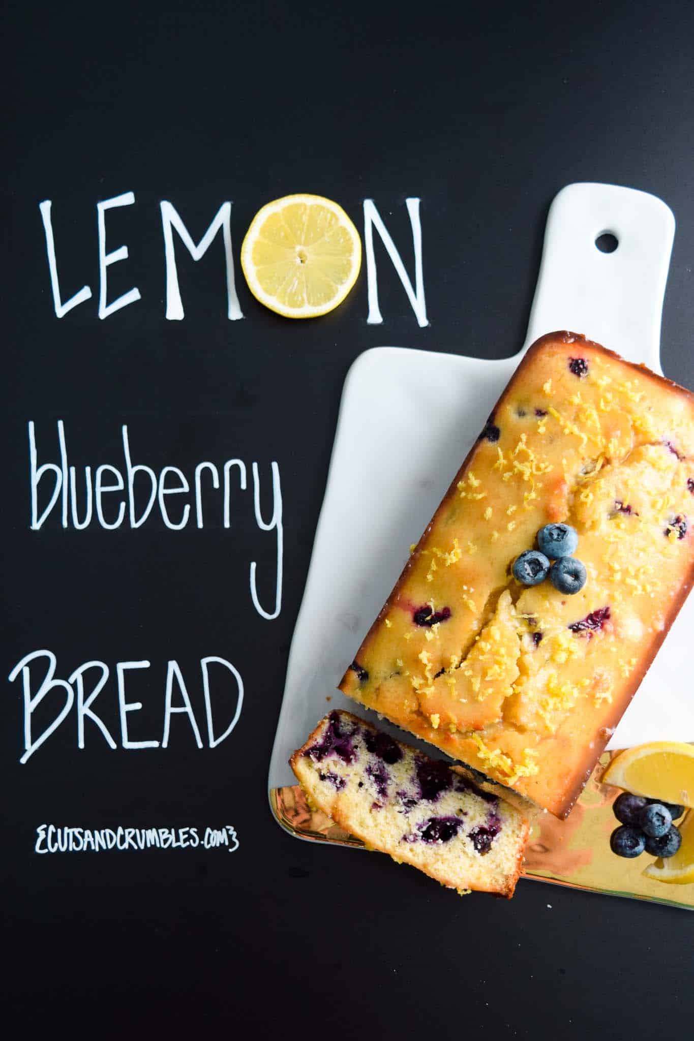 lemon blueberry bread with title written on chalkboard
