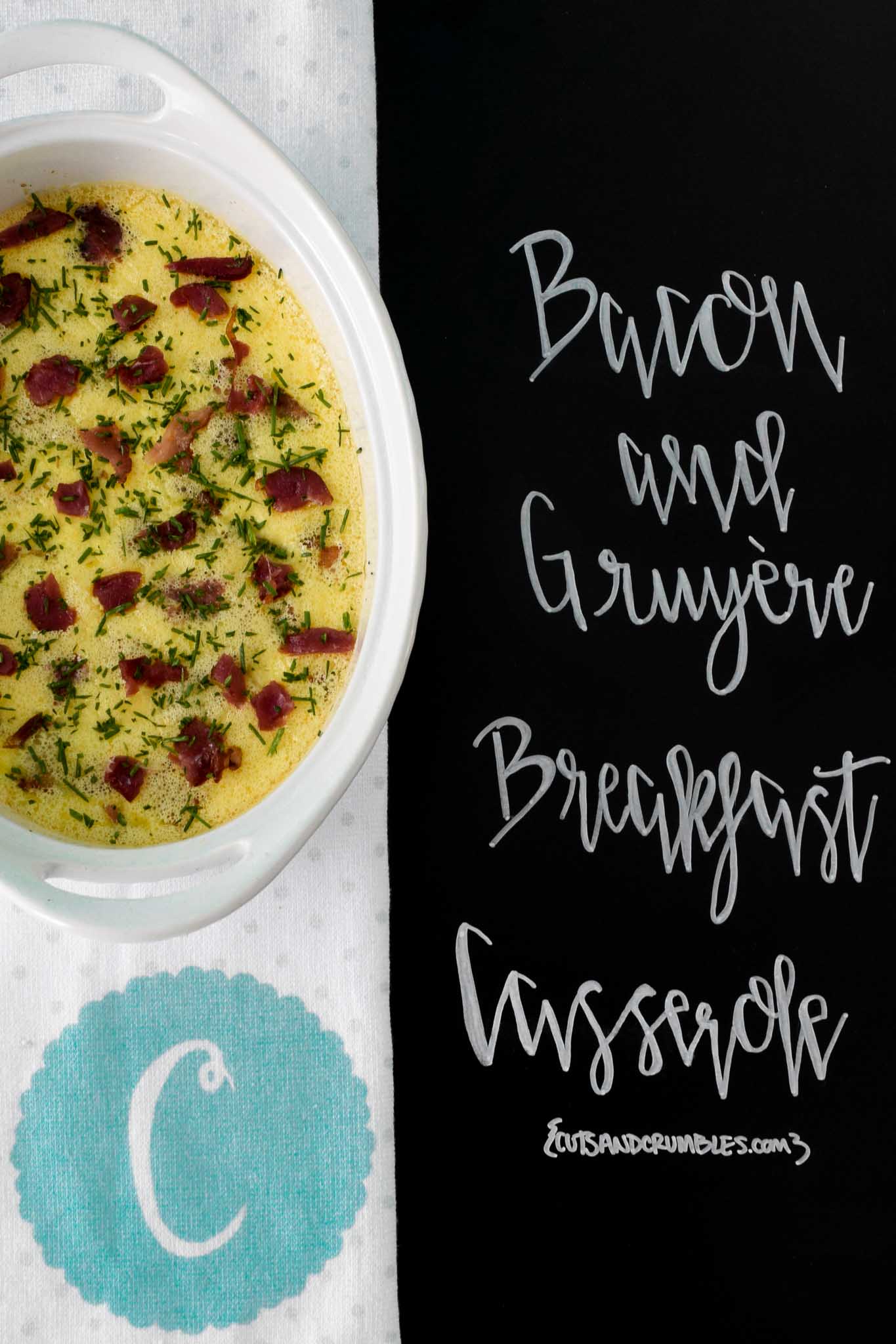 Bacon and Gruyere Breakfast Casserole with title written on chalkboard