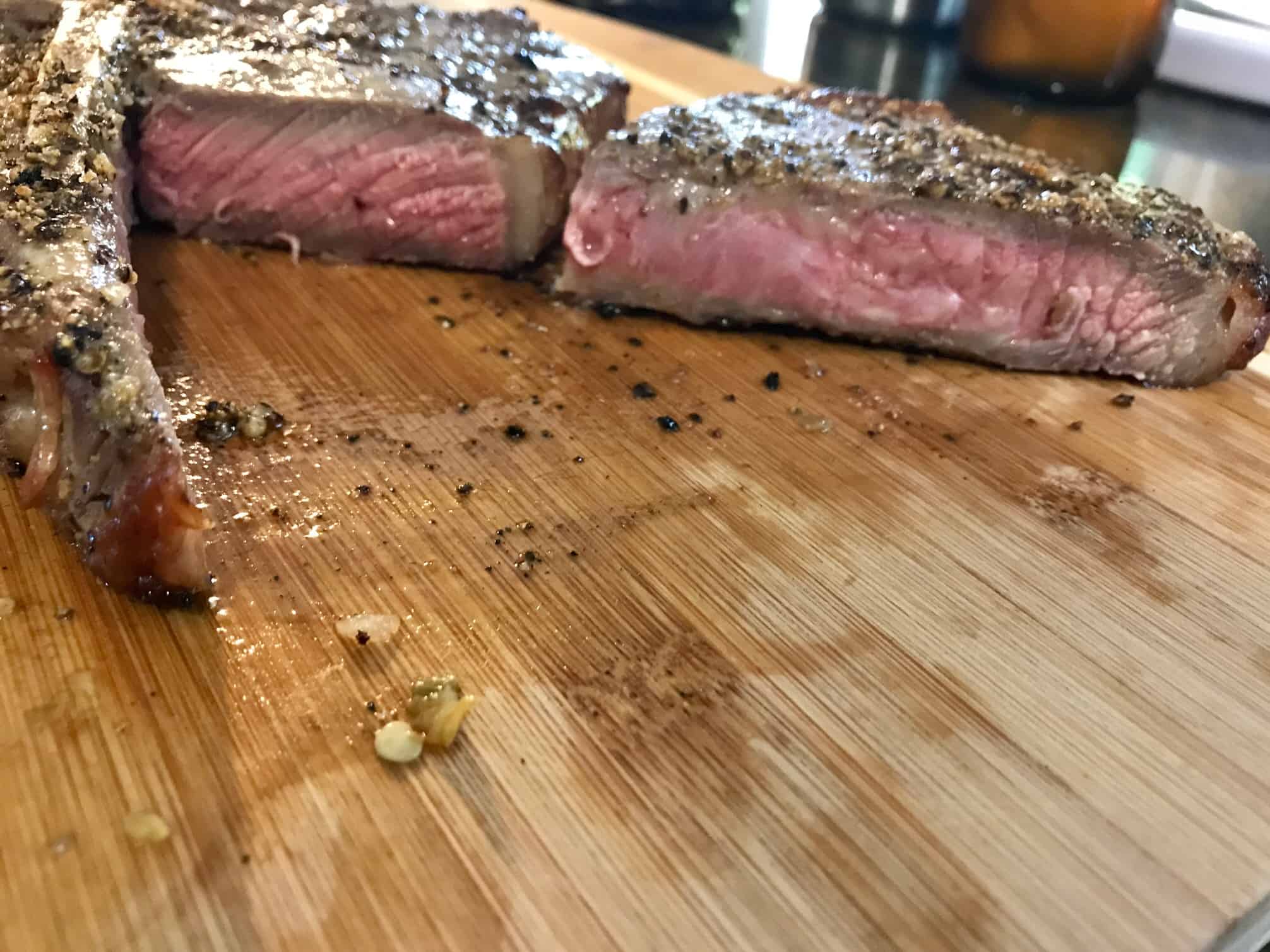 Reverse Sear Steak slice from side to show pink inside