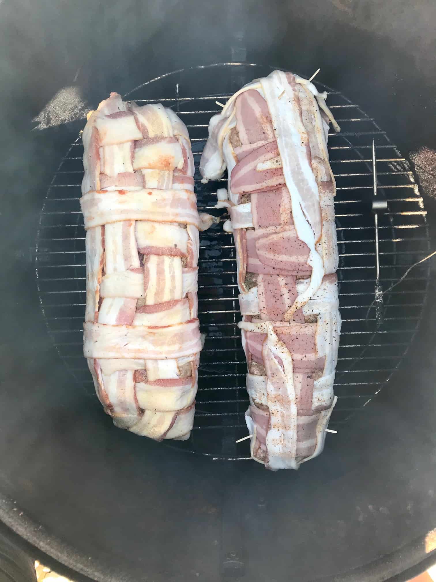 Two bacon explosions on weber grill overhead shot