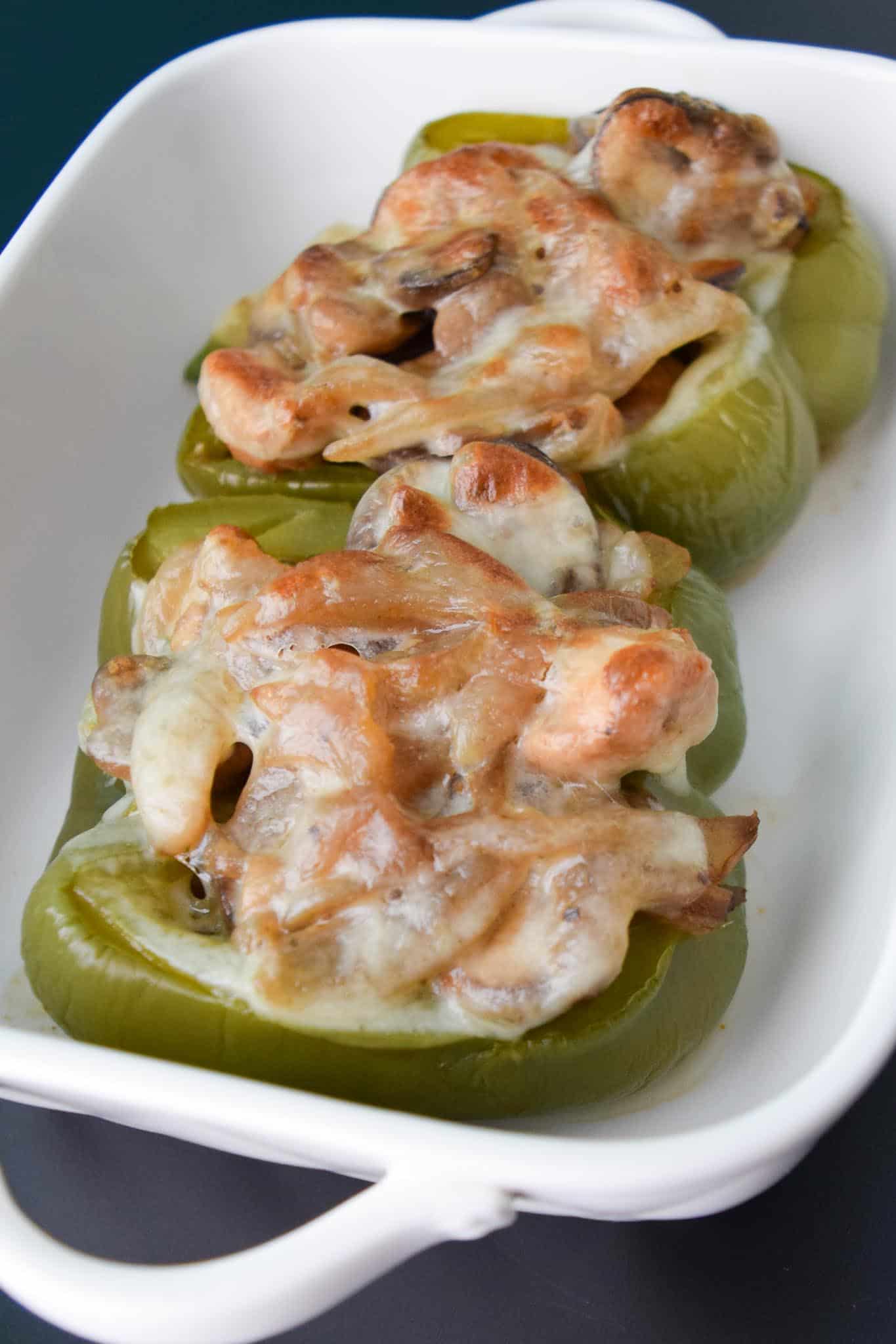 Chicken Philly Stuffed Peppers cooked in white dish close up view