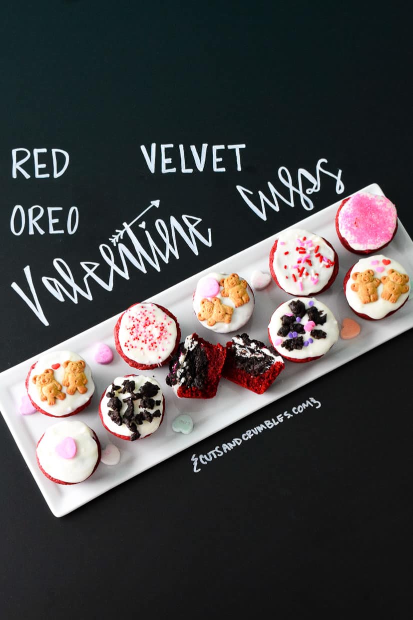 Red Velvet Oreo Valentine Cups on white platter with title written on chalkboard