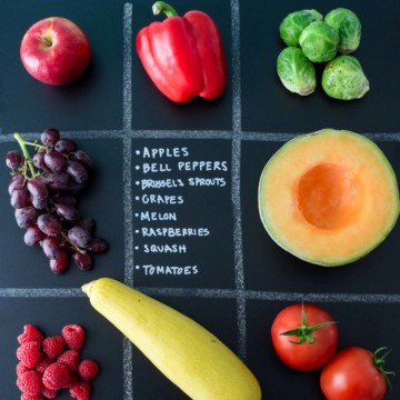 September Seasonal Produce Guide with produce in quadrants on chalkboard