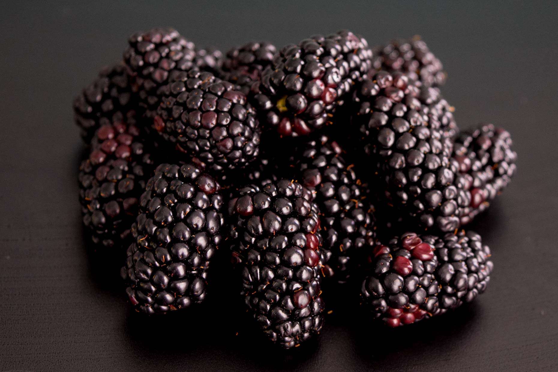Blackberries on black background 