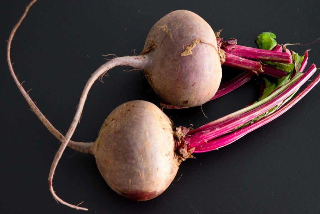 beets on black background