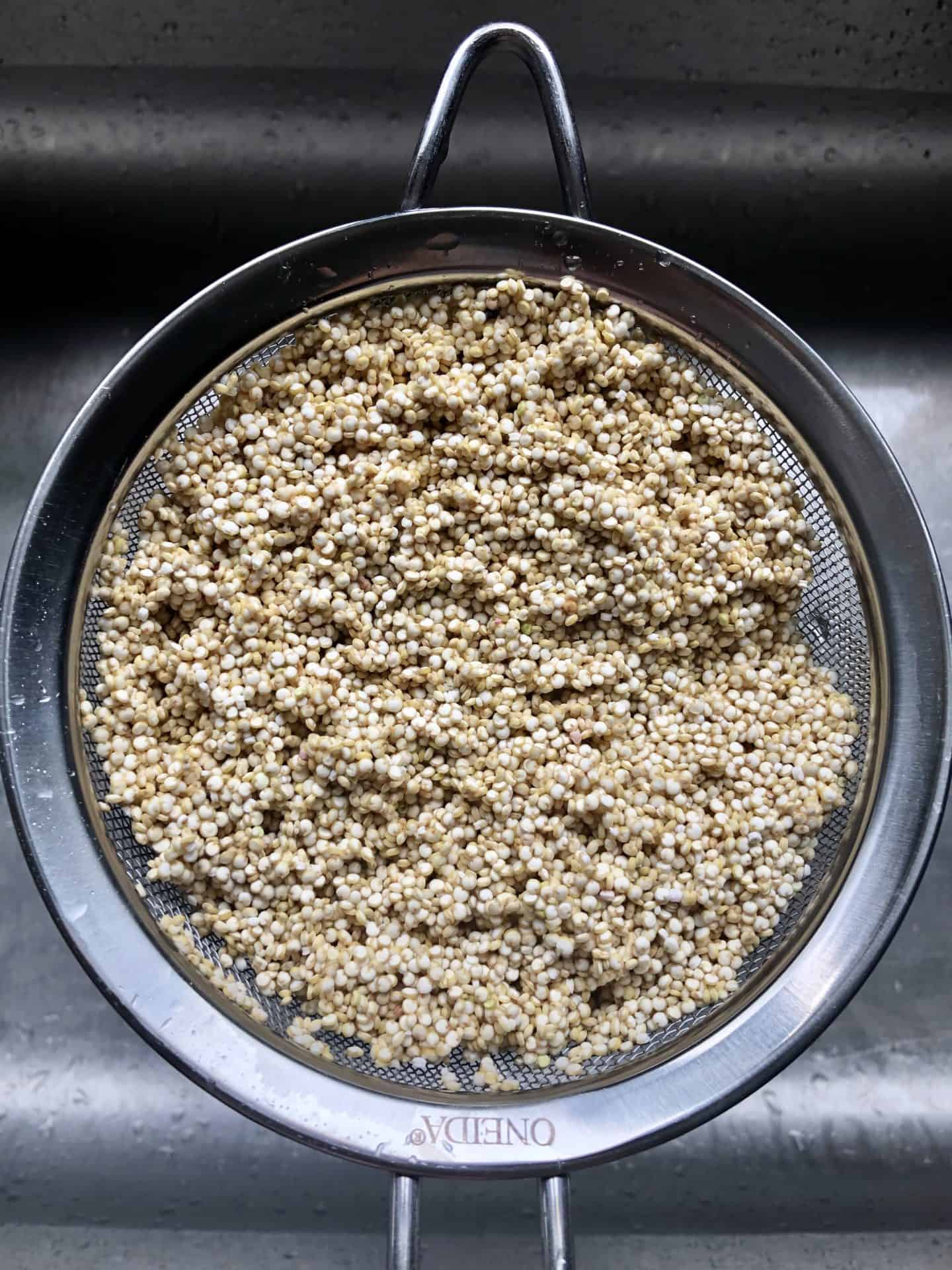 Quinoa rinsing in strainer