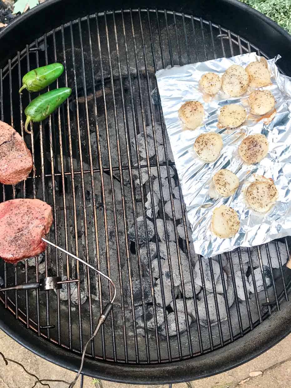 Scallops with steak and jalapeños on weber grill over direct heat