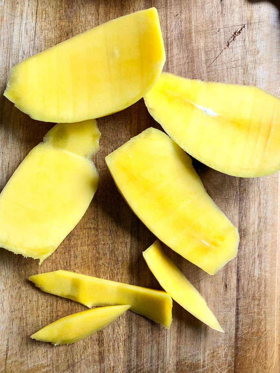 Slices of mango ready to be diced