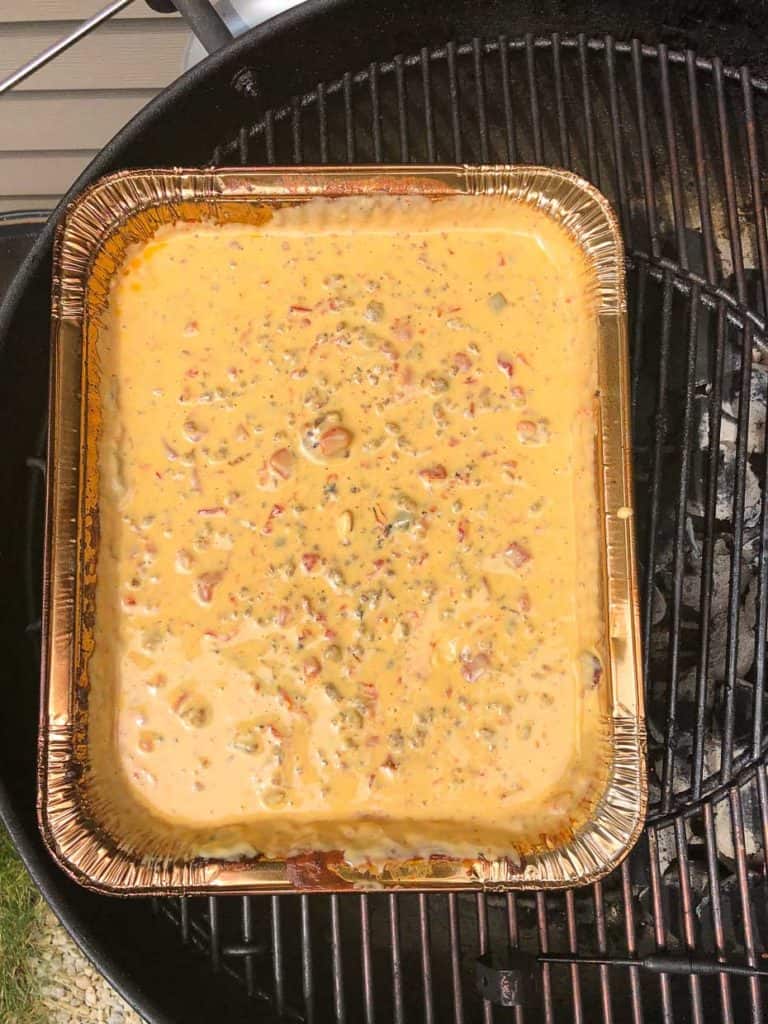 Smoked queso dip on weber grill overhead shot