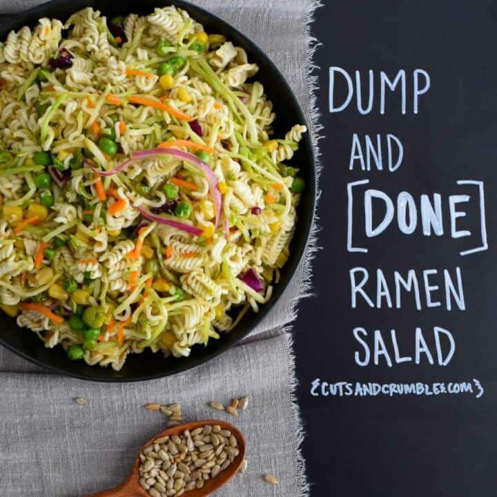 dump and done ramen salad in black bowl with title written on chalkboard overhead shot